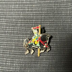 Daisy portraying Mulan on a carousel Disney trading pin